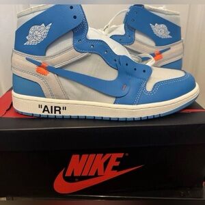 Nike Air Jordan 1 High-Tops in UNC blue with white accents and extra laces